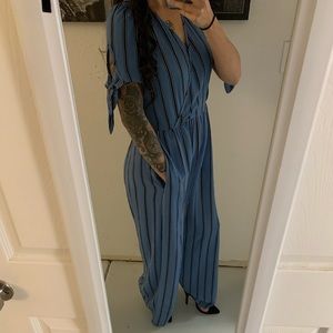 Blue striped cinch waist romper.